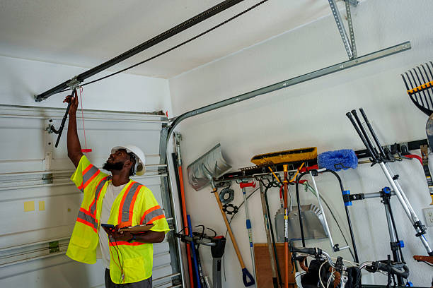 Professional Garage Door Panel Replacement technician working in Brookston, IN